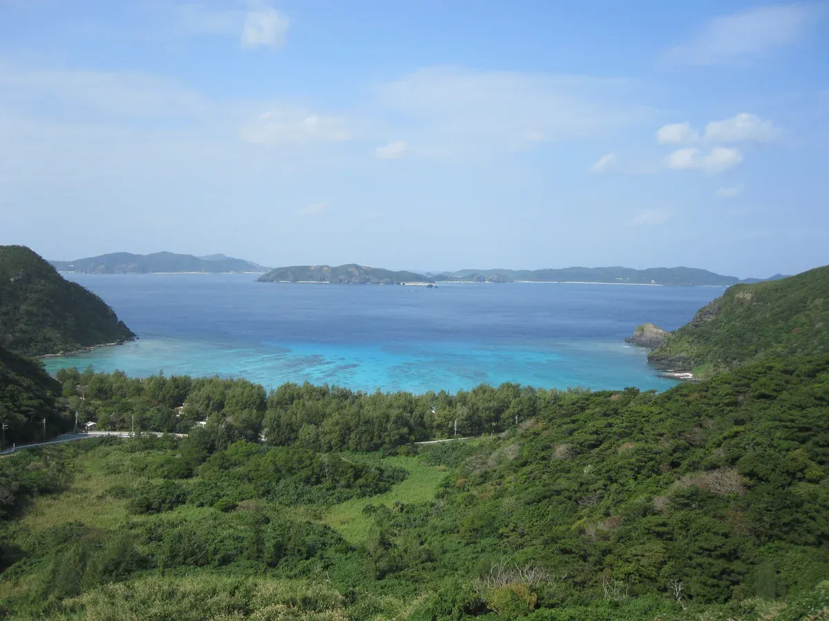 Tokashiku Beach curve of white sand and calm turquoise water on Tokashiki Island in Kerama National Park